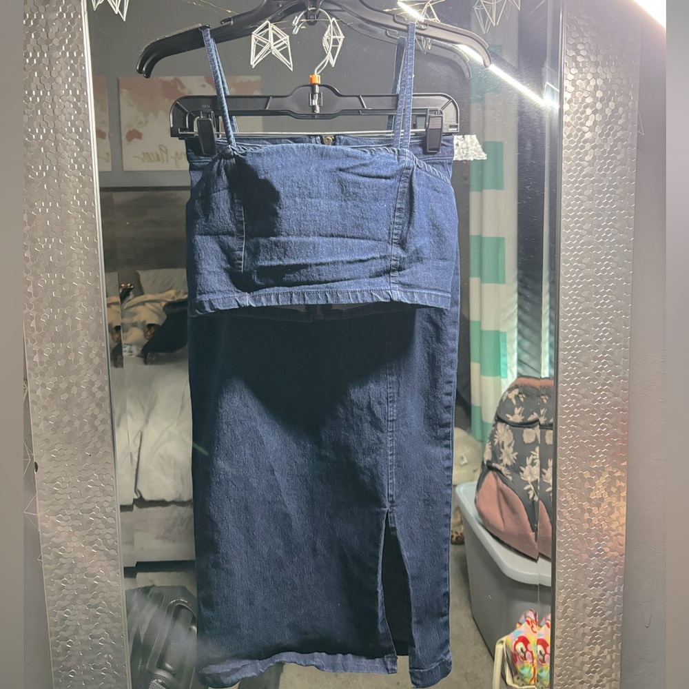 Demin two piece set with a low slit in the skirt worn once